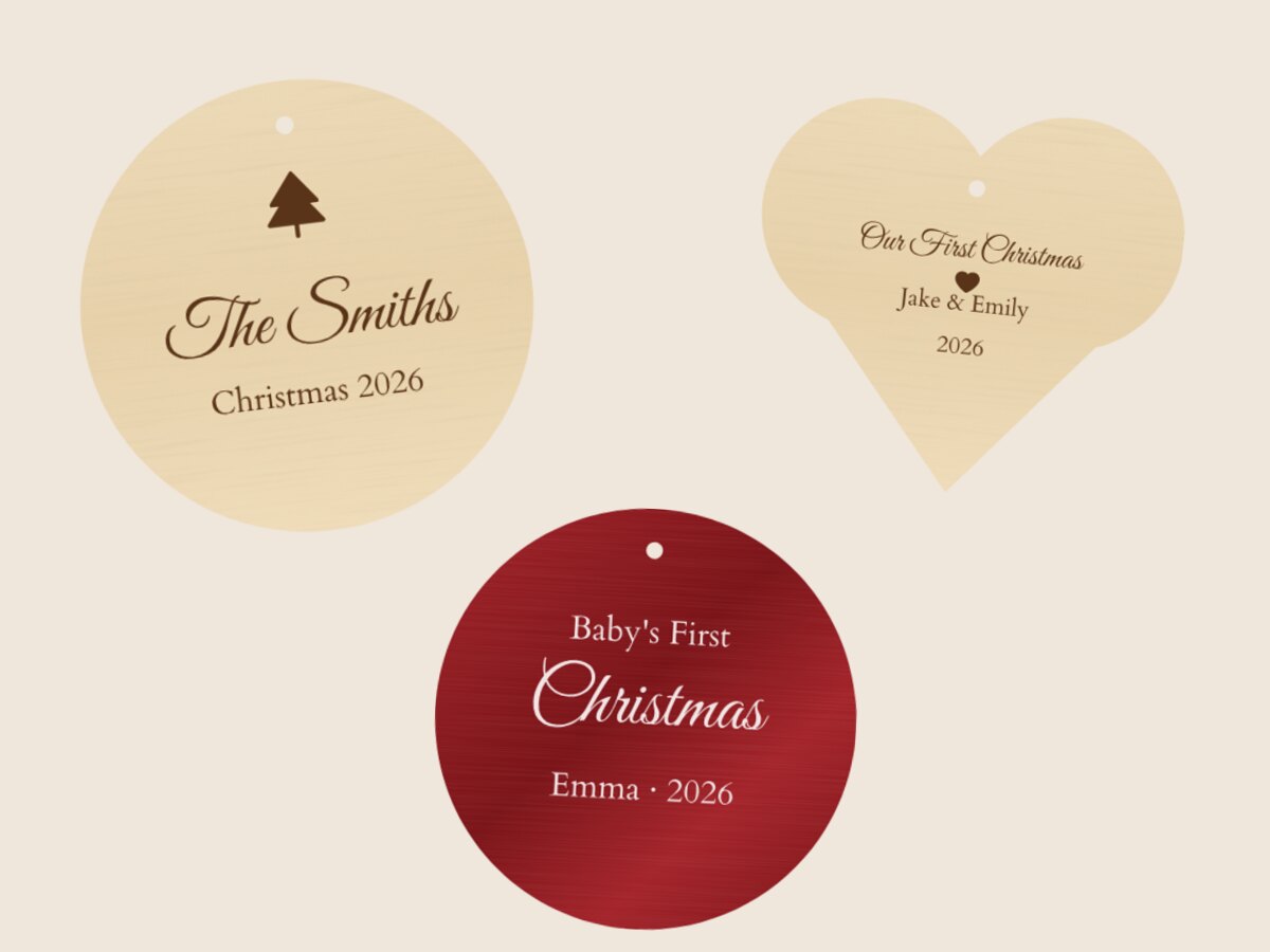 Engraved Christmas ornaments — wood rounds, a heart and red aluminum